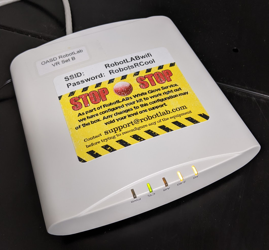 The Router: the box with a yellow warning on the top